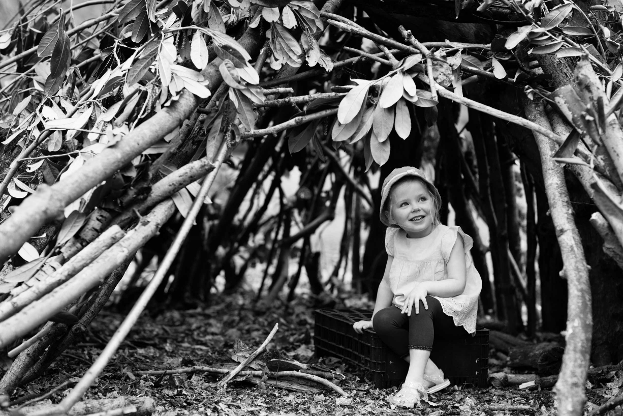 A den made from sticks and leaves is just the place to hide during fun and games in Hampstead.